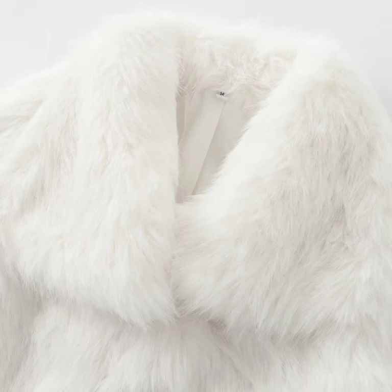 Stay warm and stylish this winter with a women’s white faux fur cropped jacket. Featuring a fluffy, plush design with long sleeves, it’s perfect for casual or elegant looks.