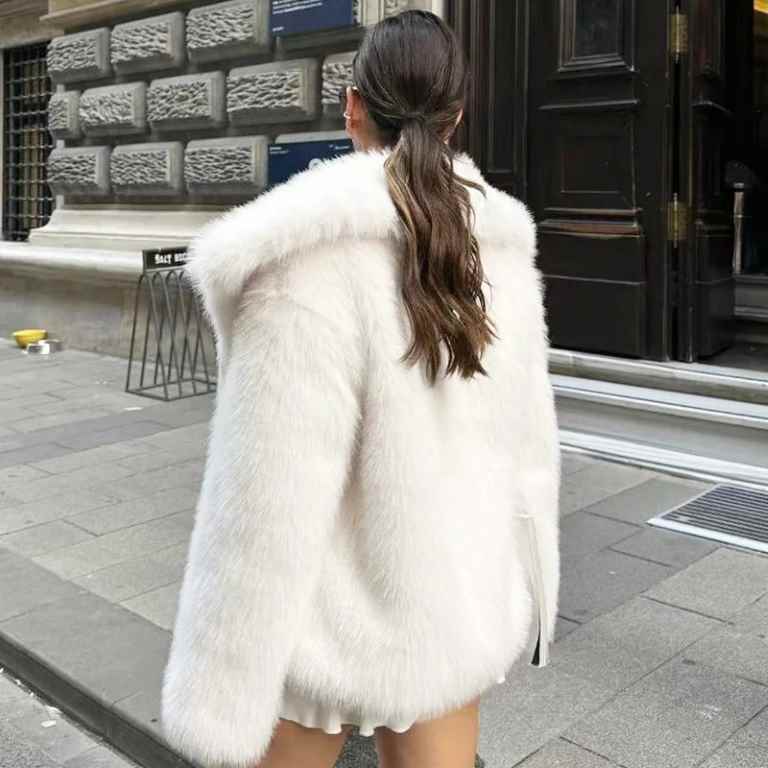 Stay warm and stylish this winter with a women’s white faux fur cropped jacket. Featuring a fluffy, plush design with long sleeves, it’s perfect for casual or elegant looks.