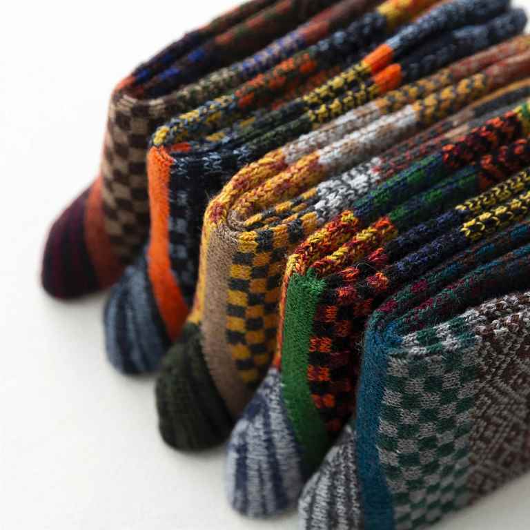 Keep your feet warm this winter with thickened sheep’s wool socks for men. Retro-style, colorful, and perfect for snow boots, these cozy socks are a must-have!